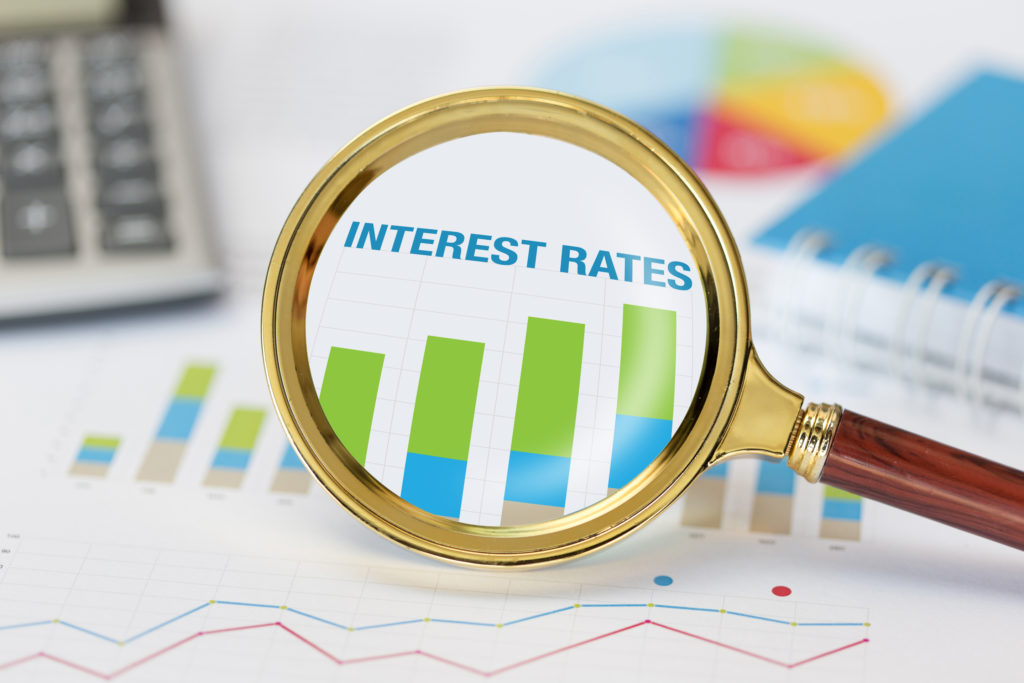 rates-index interest rates in magnifying glass